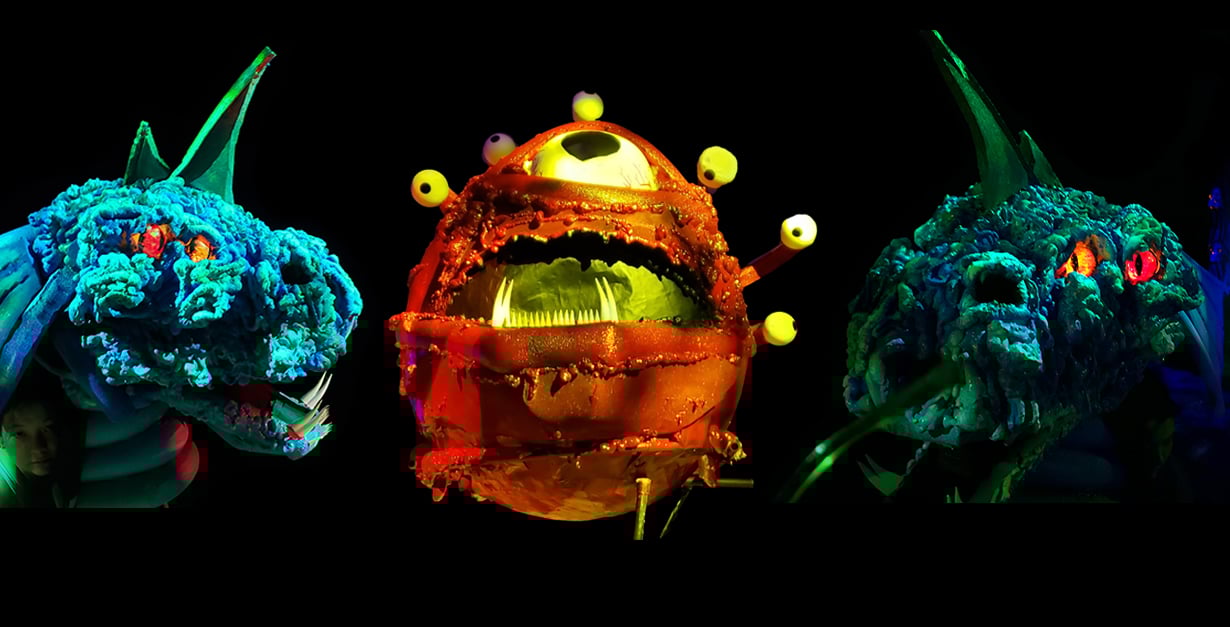 Illuminating Monsters On Stage In A Saturated Color Scheme